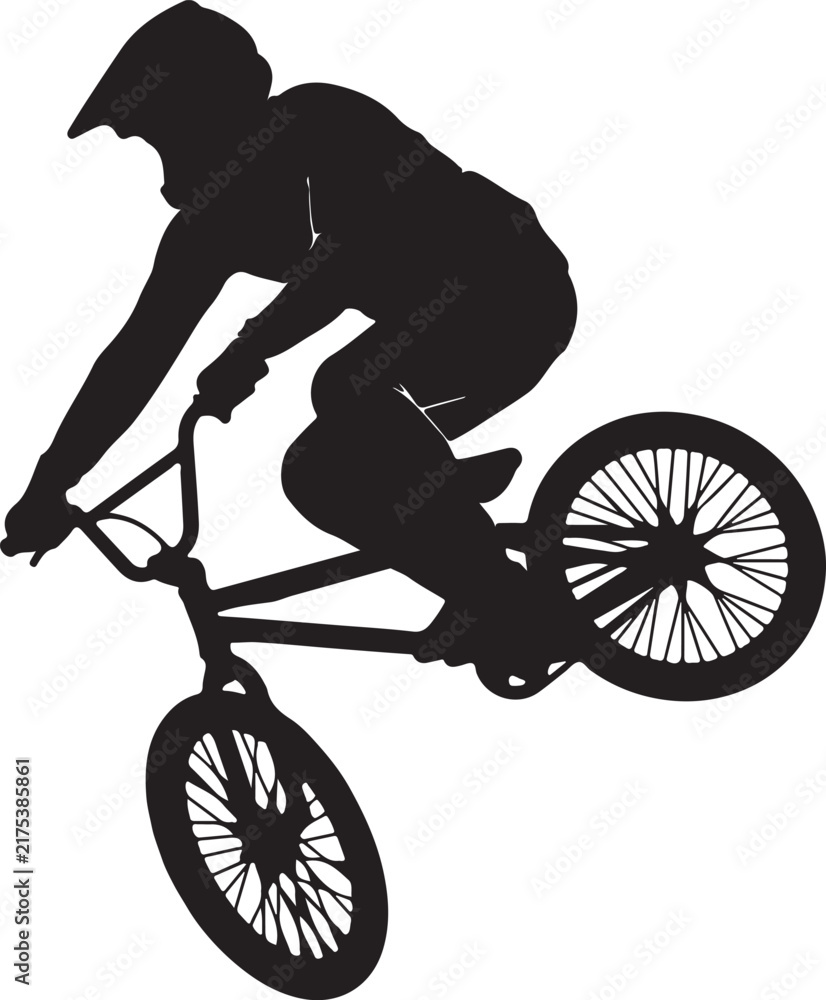 Fototapeta premium BMX rider performing a tabletop jump in mid-air on a dirt track