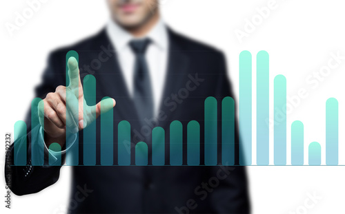 A blurred businessman in a suit pointing at a peak on a glowing green rounded column chart. Concept of financial data analysis, stock market trading, performance tracking, statistical research, and co