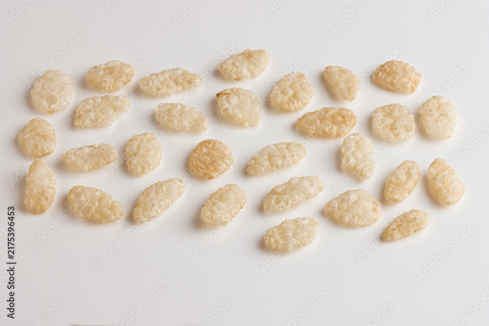 Obraz premium Rice Puffs Crisps Crispies cereal assorted close up on white