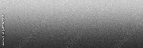A monochromatic horizontal gradient background, transitioning from light, gray at the, to a deep, dark charcoal gray, at the bottom, with grain
