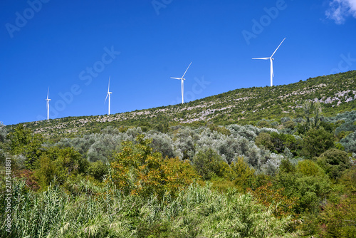 Tapety artystyczne A group of windmills on a hill ridge near Ujcinj