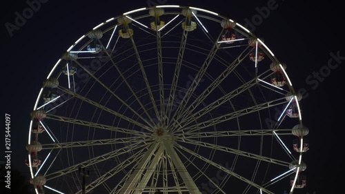 Large Ferris Wheel Ride Glowing at Night