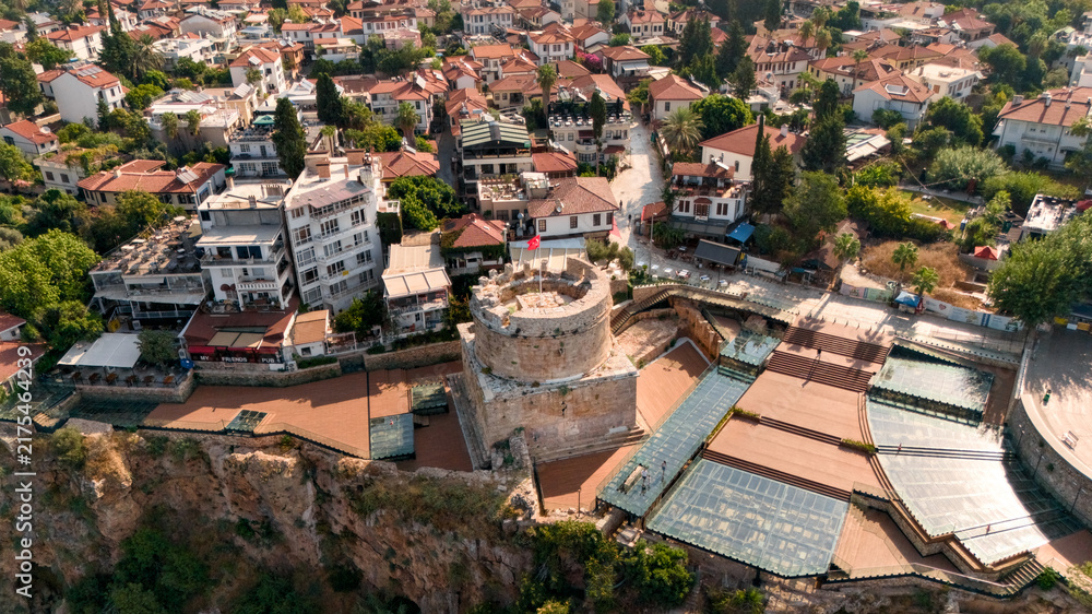 Obraz premium Aerial view of Hidirlik Tower and historic Kaleici rooftops in Antalya, Turkey