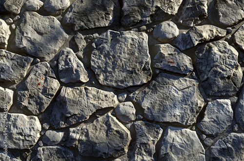Photo of Old grey antique cobble stone wall. Background texture for backdrops or mapping