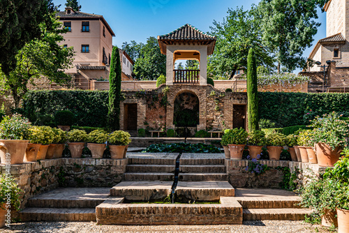 terraced gardens and pavilion of El Partal at the Alhambra in Granada, Spain.