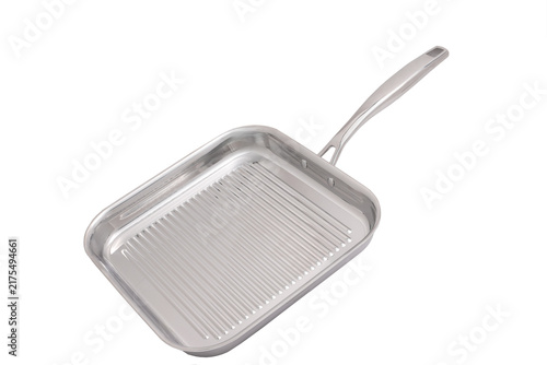 Shiny stainless steel grill pan with raised ridges for cooking steaks and vegetables