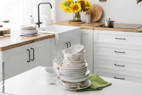 Konstfotografi Household chores and domestic burden, stack of dirty dishes and messy bowls on a