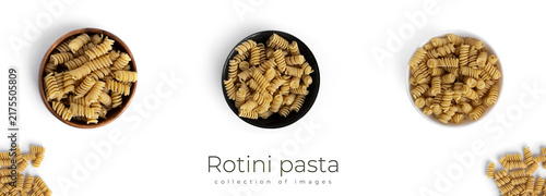 Tapety artystyczne Rotini pasta isolated on a white background.