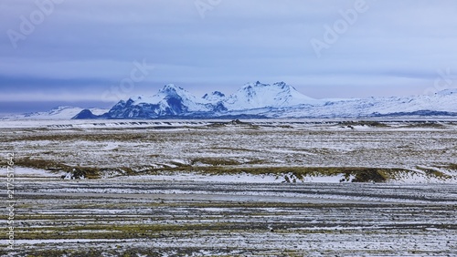 Snow-capped mountains and overgrown river landscape, onset of winter, Fjallabak Nature Reserve, Sudurland, Iceland