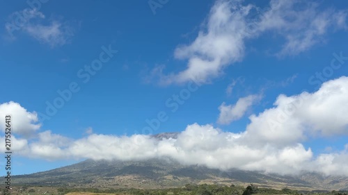 White Clouds Against a Bright Blue Mountain Sky

