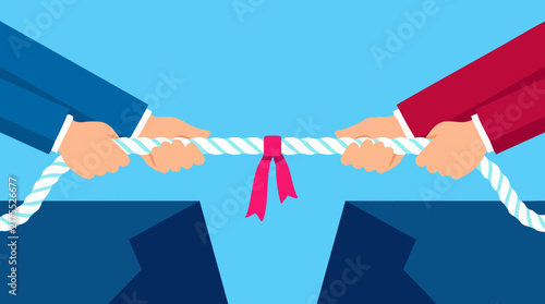 Fotografía Business competition and rivalry concept with tug of war game over a chasm