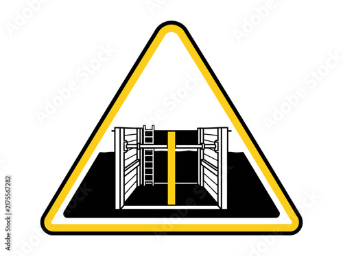 Caution symbol showing a shored trench excavation with vertical support beams and ladder.