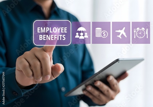 Employee touching digital tablet screen displaying employee benefits and human resources icons