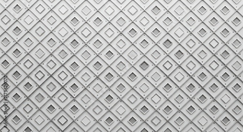 Geometric wall pattern with repeating white diamond shapes, recessed squares, and diagonal grid lines in a monochromatic architectural facade