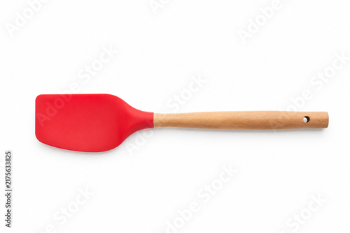 Red silicone spatula with wooden handle isolated