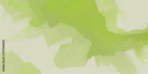 Soft light green watercolor texture with organic brush strokes on textured paper background for artistic design and creative projects