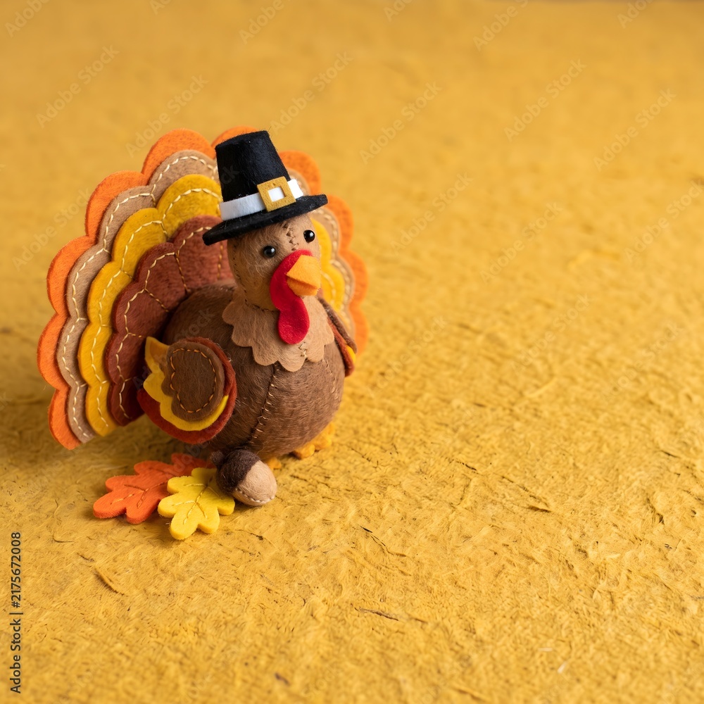 Fototapeta premium High Angle Macro Photo of Handmade Felt Thanksgiving Turkey with Copy Space