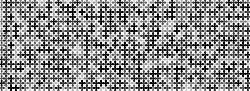 monochrome grid-like pattern composed of tiny four-petaled flower icons in various shades of black, gray, and white.