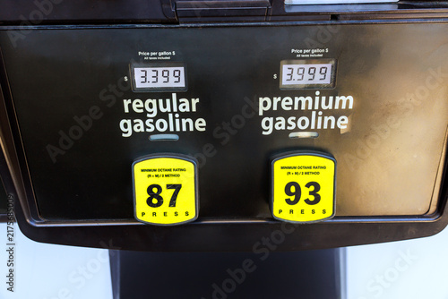 Fotografía Two fuel pumps show prices for regular, premium gasoline these signs are located