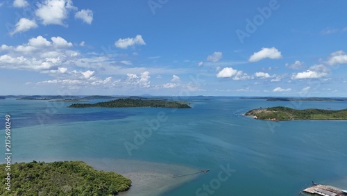 Картината върху платно Aerial View of Tropical Islands in Serene Blue Waterscape