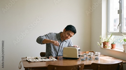 Young Man Repairing a Household Item for Sustainable Living