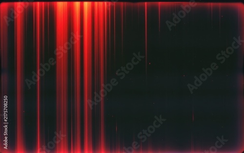 Vertical red light streaks on a dark background with a glowing, grunge texture effect.