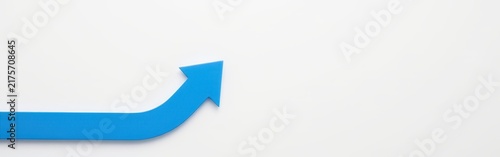 Blue arrow curving upward on white background symbolizing growth and progress.
