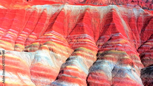 Aerial view of Zhangye Colorful Danxia landform, vibrant rainbow‑colored mountain strata in Gansu, China
Drone footage of Zhangye Qicai Danxia