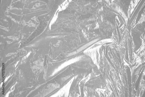 plastic wrap film wrinkled texture transparent reflective highlights isolated realistic packaging material shipping storage protection