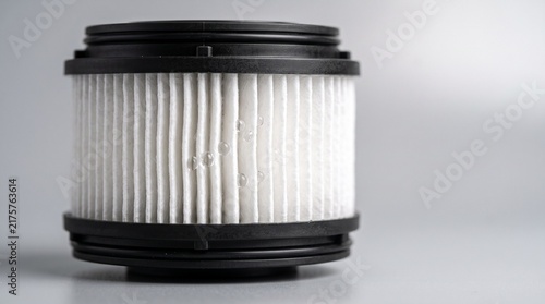 Cylindrical pleated air filter element with black plastic end caps