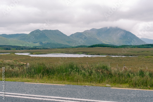 Fotografie Twelve Bens mountain range, a rugged chain of peaks rising above the scenic Connemara landscape in western Ireland - County Galway, Ireland - 31 August 2026