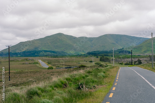 Fotografie Twelve Bens mountain range, a rugged chain of peaks rising above the scenic Connemara landscape in western Ireland - County Galway, Ireland - 31 August 2026