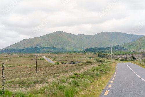 Fotografie Twelve Bens mountain range, a rugged chain of peaks rising above the scenic Connemara landscape in western Ireland - County Galway, Ireland - 31 August 2026