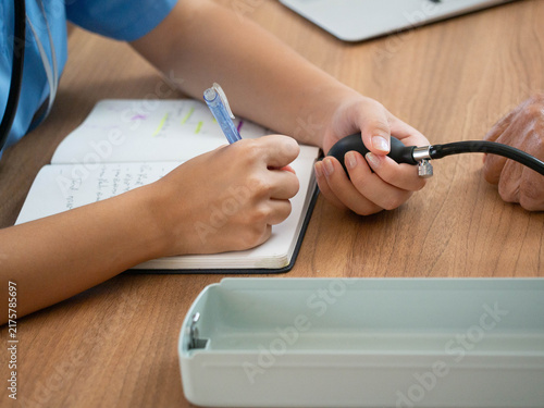 pressure high blood health medical health care disease patient pulse note write equipment measurement sphygmomanometer pressure high blood health medica check blood woman doctor treatment hospital