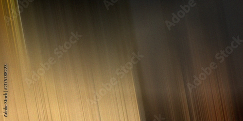 Dramatic dark abstract background with diagonal golden light streaks and grainy texture for cinematic luxury branding.