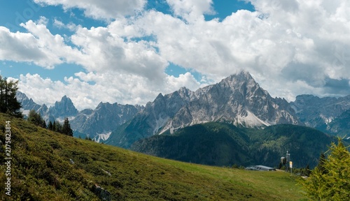 Snow-Capped Mountain Peaks with Dramatic Clouds