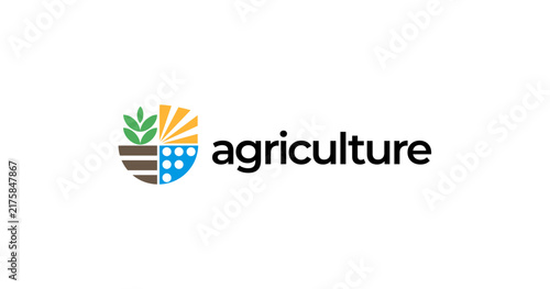 Shield Shape Agriculture Logo Design with Sun Leaf Soil and Water Elements