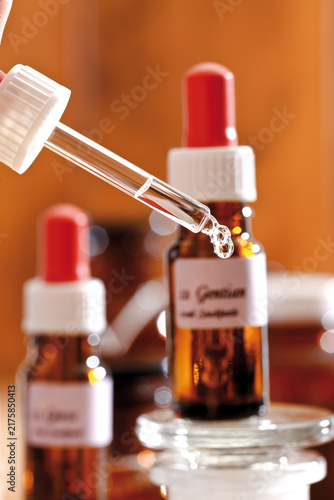 Homeopathic remedies, Drop falling from a pipette, close-up