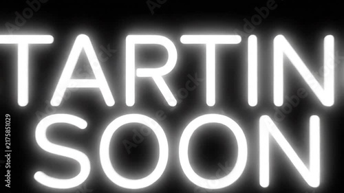 Artistic Neon Sign Reading Artisanal words in bright glow in dark environment