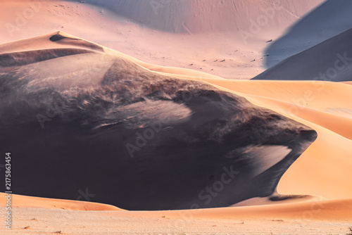 Принти на полотні Wind Blowing Sand Across Desert Sand Dunes in Sossusvlei