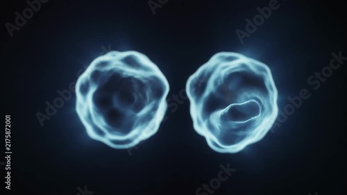 Glowing Translucent Cell Dividing in Two, Mitosis Biology Concept