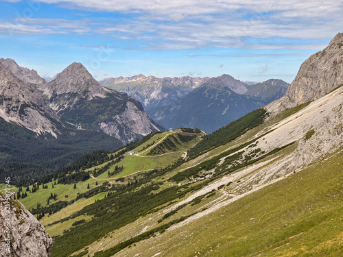 mountain landscape in the Austrian alps with the Gatterl hiking trail ascending from Ehrwalder Alm