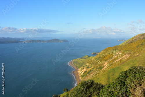 Foto This scenic coastal view appears to show the Omanawanui Track looking out toward