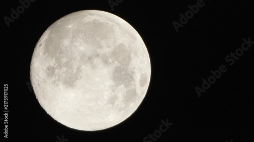 Moon astronomy space capturing a detailed view of the lunar surface with craters and highlights against the pitch black night sky
