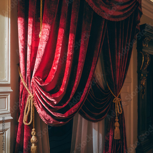 luxury red curtains in Victorian style with drape