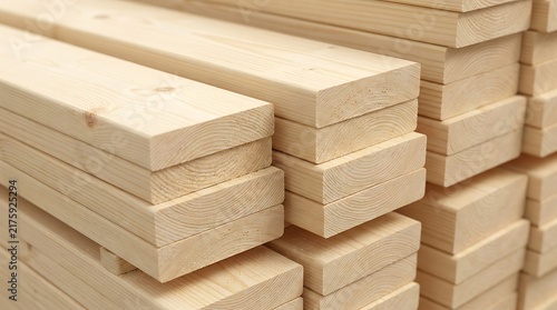 Pile of natural pine wood planks showing grain texture closeup