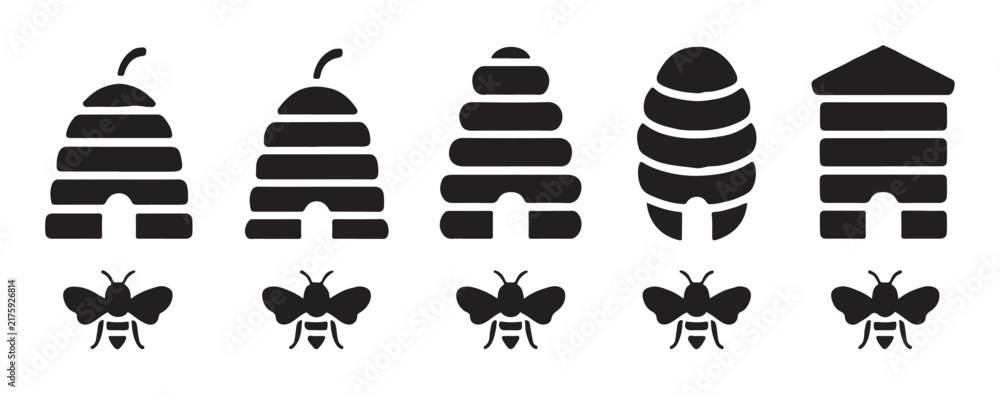 Naklejka premium Traditional beehive skep icons and flying bees silhouettes for organic honey farm labels and apiculture logos.