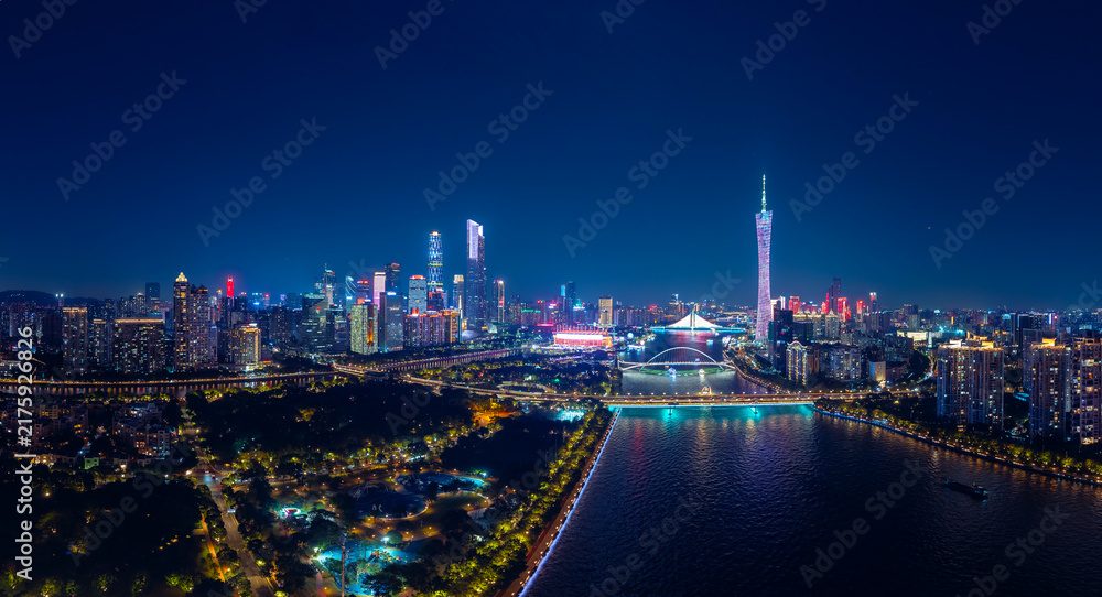 Fototapeta premium Night landscape of illuminated cityscape with skyscrapers, aerial view Guangdong Guangzhou, China