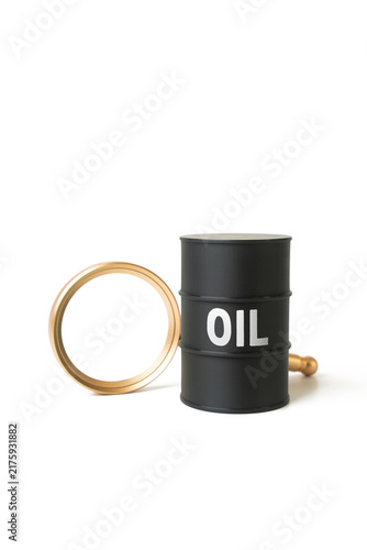 Foto Oil barrel and magnifying glass