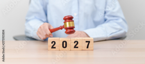 Fotografie Happy New Year 2027 with judge gavel on table